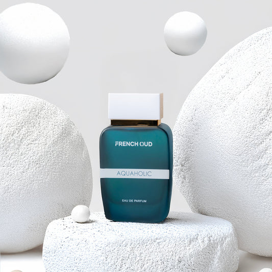 "AQUAHOLIC men’s perfume bottle – fresh citrus and oud fragrance with grapefruit, mint, incense, and patchouli by Armondae"