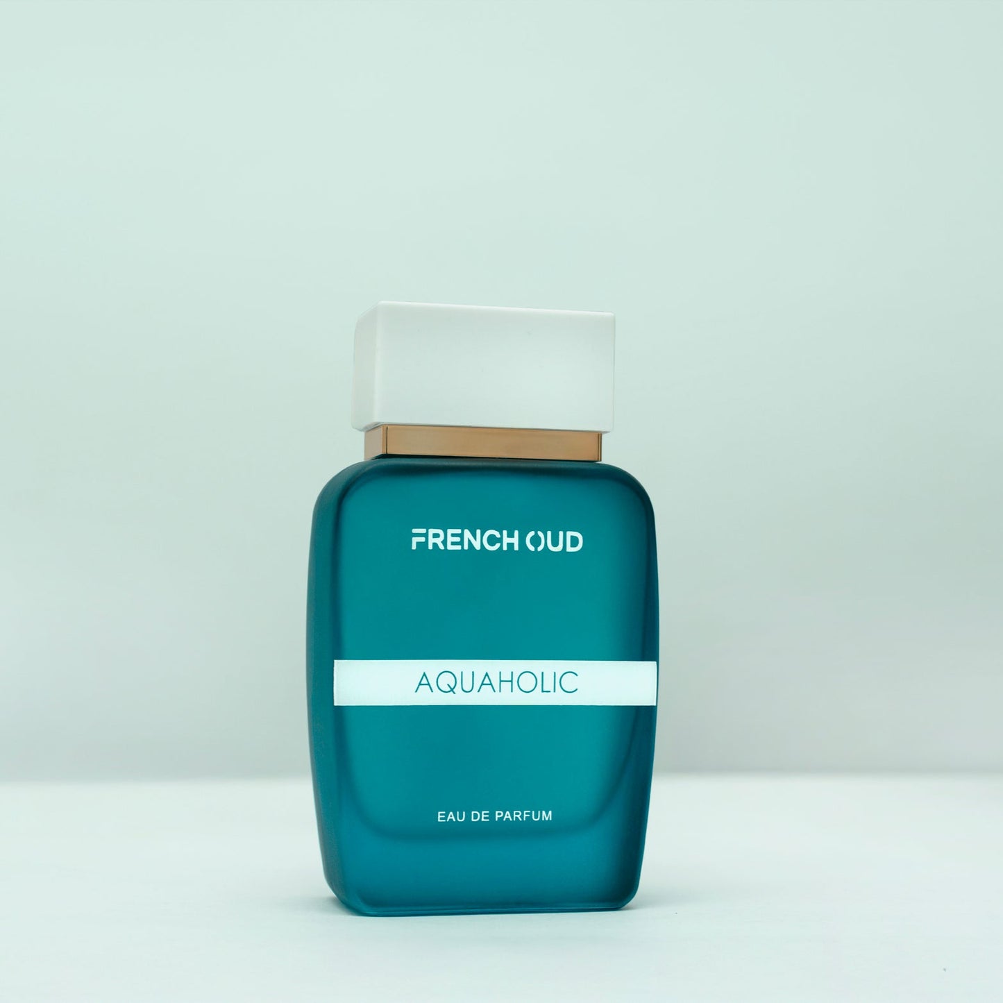 "AQUAHOLIC men’s perfume bottle – fresh citrus and oud fragrance with grapefruit, mint, incense, and patchouli by Armondae"